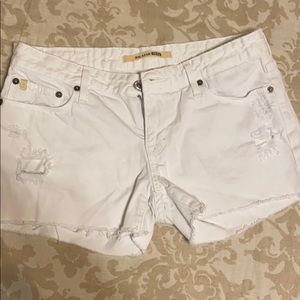 White distressed jean shorts